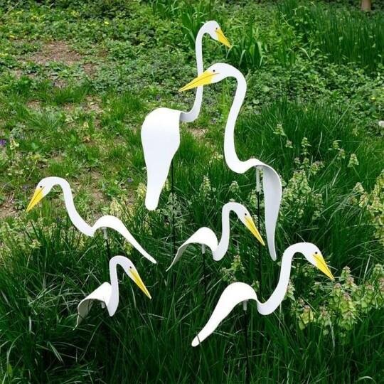 🦩 Swirl Bird 🦩 Een grillige en dynamische vogel die ronddraait met de zachte tuinbries 